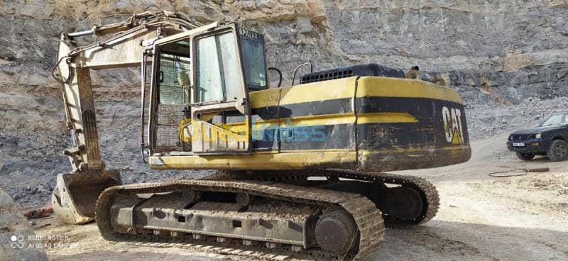 Pelle Caterpillar 325BL 2