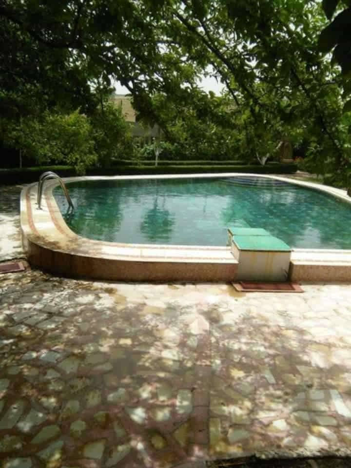 Villa avec piscine et grand jardin à ouled rahmoune 7