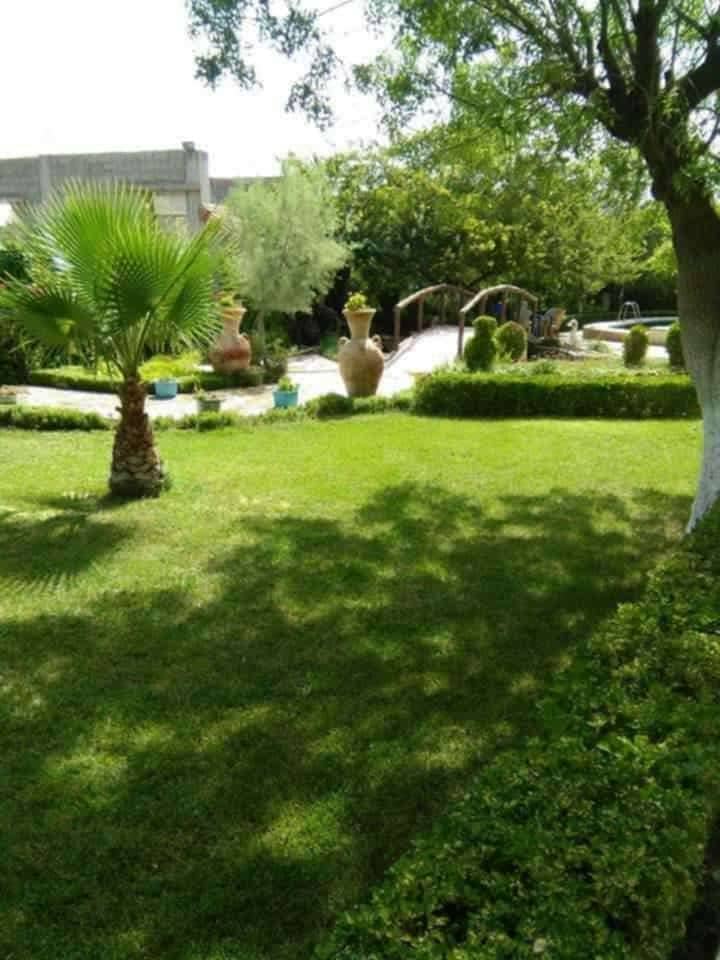 Villa avec piscine et grand jardin à ouled rahmoune 10