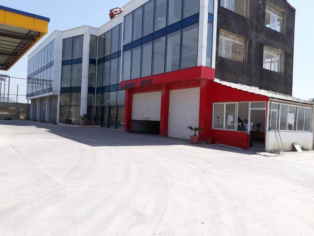 أرض صناعية مساحتها 32000m2 للبيع على الطريق الوطني برحال عنابة فيها حاليا محطة بنزين و معرض سيارات و محطة غسيل السيارات 2